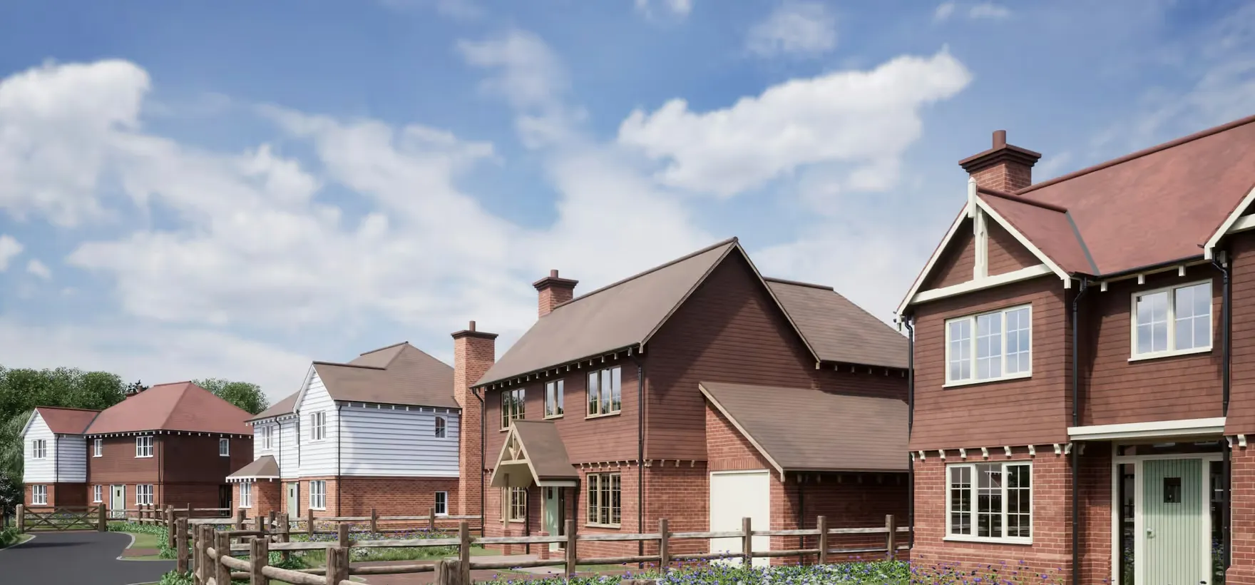 A row of local red-brick houses on a quiet residential street